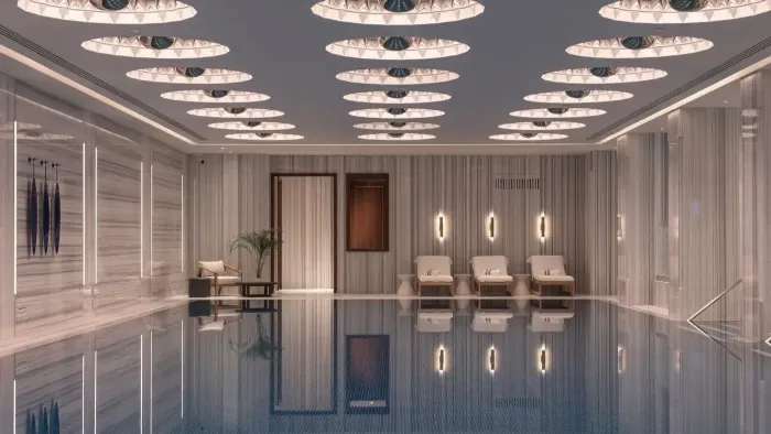 Antalya'da lüks bir spa merkezinin şık ve huzurlu dinlenme alanı, rahat şezlonglar, bitki çayları ve sakin bir atmosfer