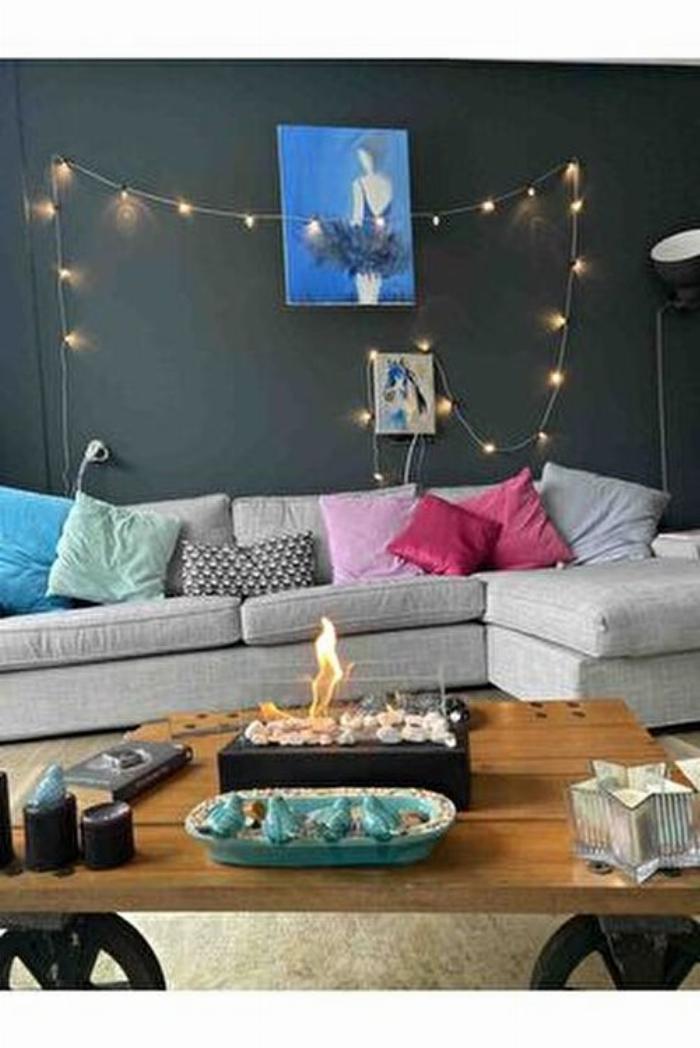 Evinin bir köşesine kurulmuş, ahşap ve cam tasarımlı modern bir ev tipi sauna